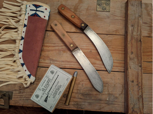 Zwei original Russell Green River Messer