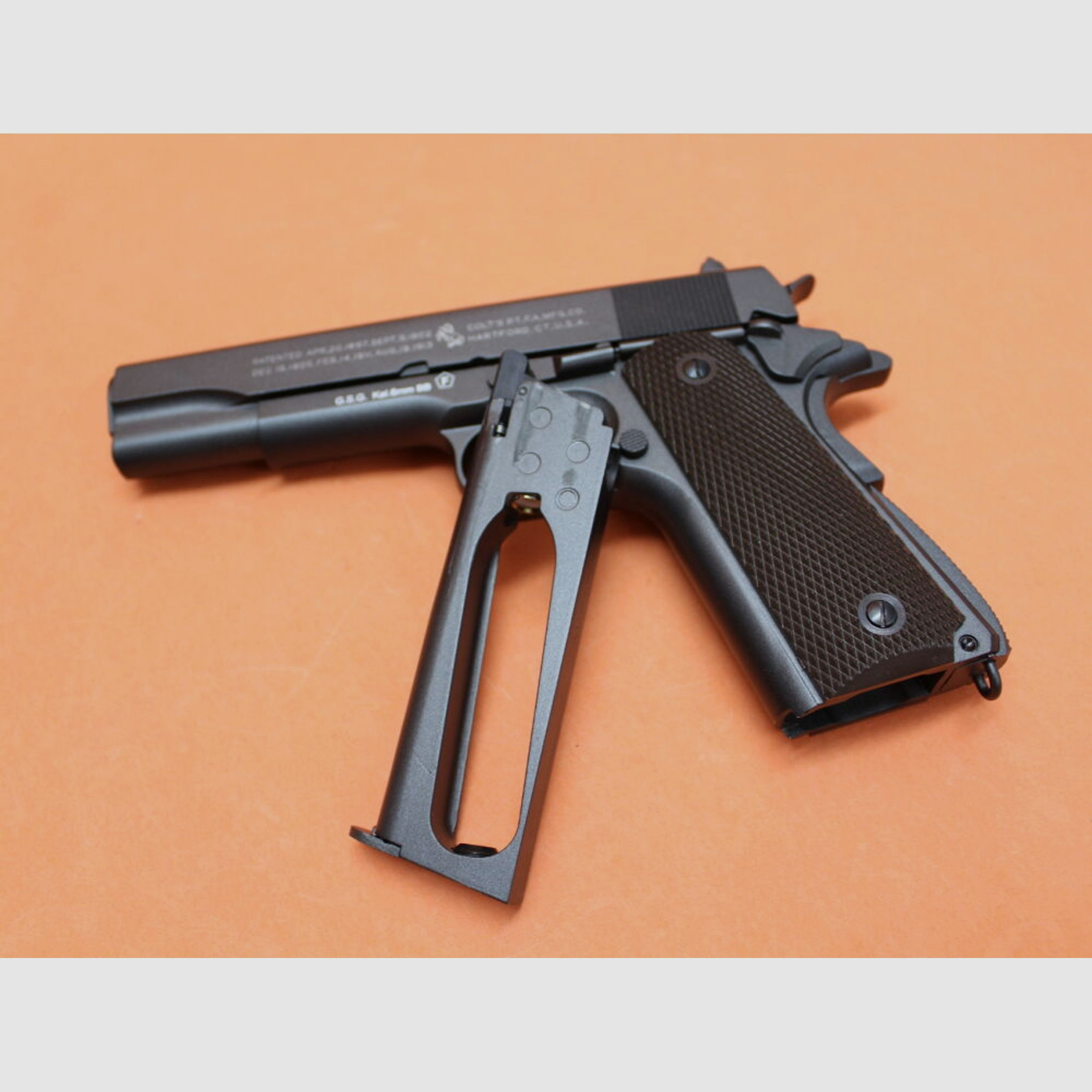 KWC.	 Airsoft CO2BB 6mm(Bullet) Colt® M1911A1 Pistole System CO2-Blow-Back (Semi-Auto)/ BAX S