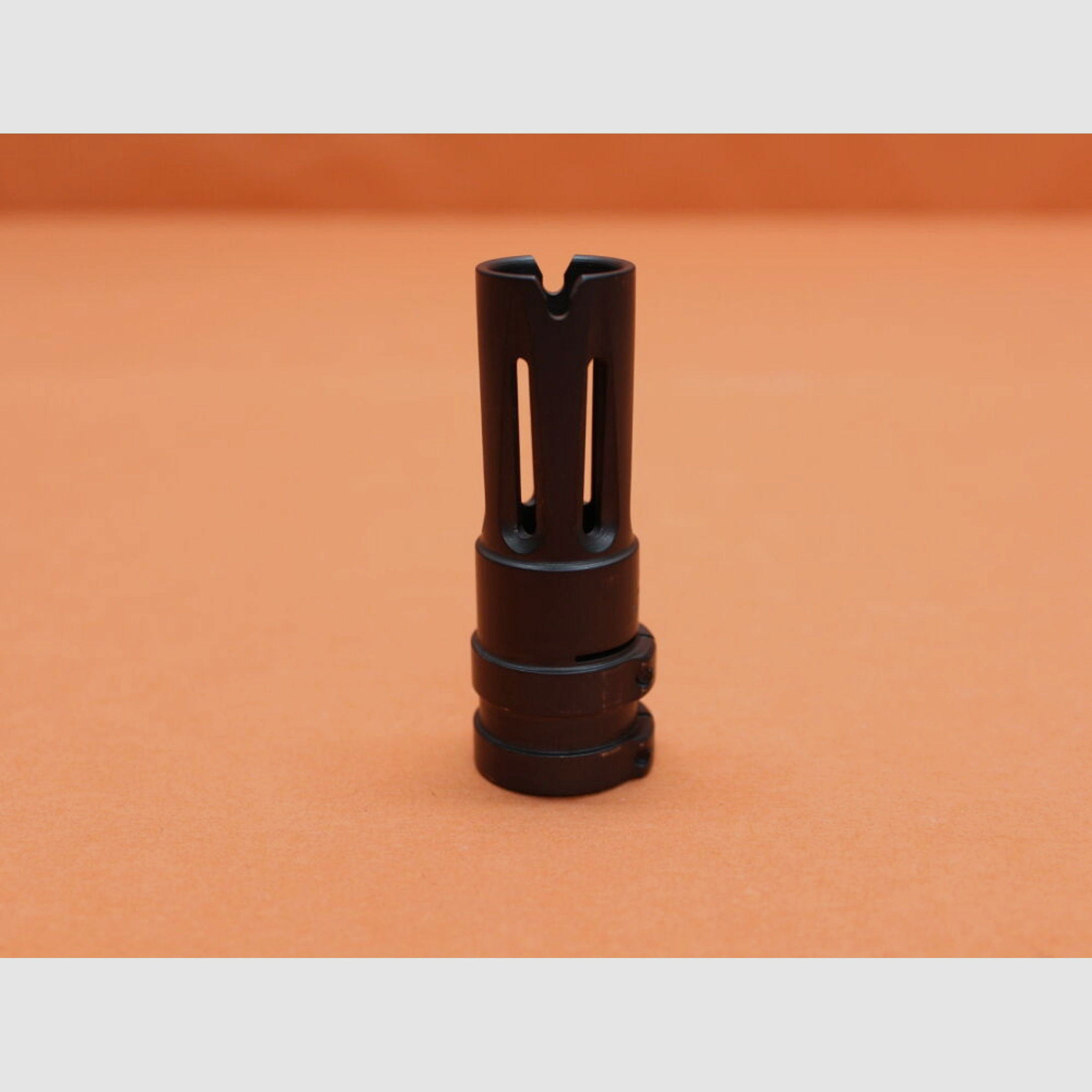 Steger	 Steyr Mannlicher AUG-Z: Mündungsfeuerdämpfer Steger Klemmbefestigung für Lauf-Ø 19,8mm, Stahl brüniert