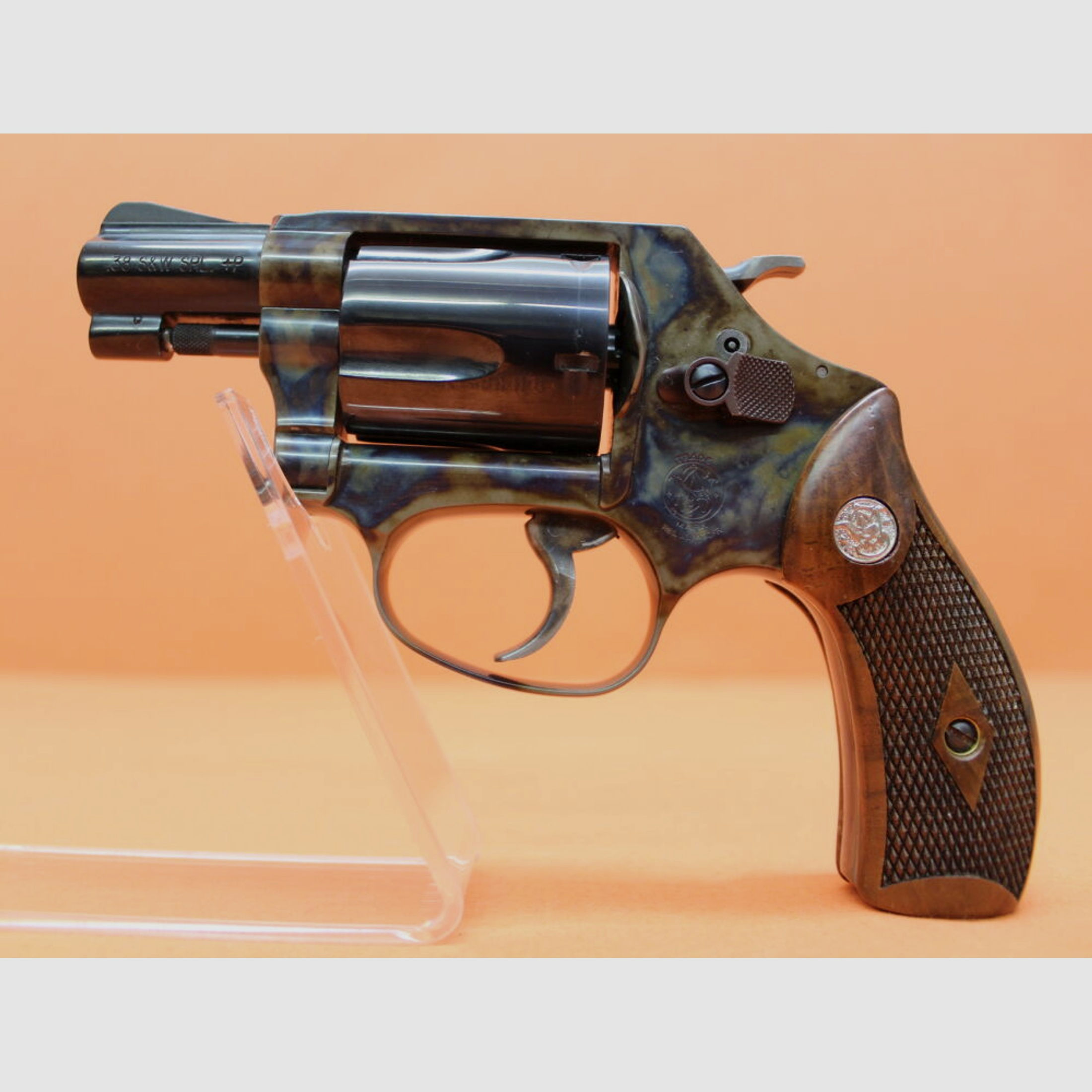 Smith & Wesson/S&W	 Revolver .38Special Smith&Wesson/ S&W36-10 brüniert/ buntgehärtet, 1 7/8" Lauf/ Holzgriffschalen