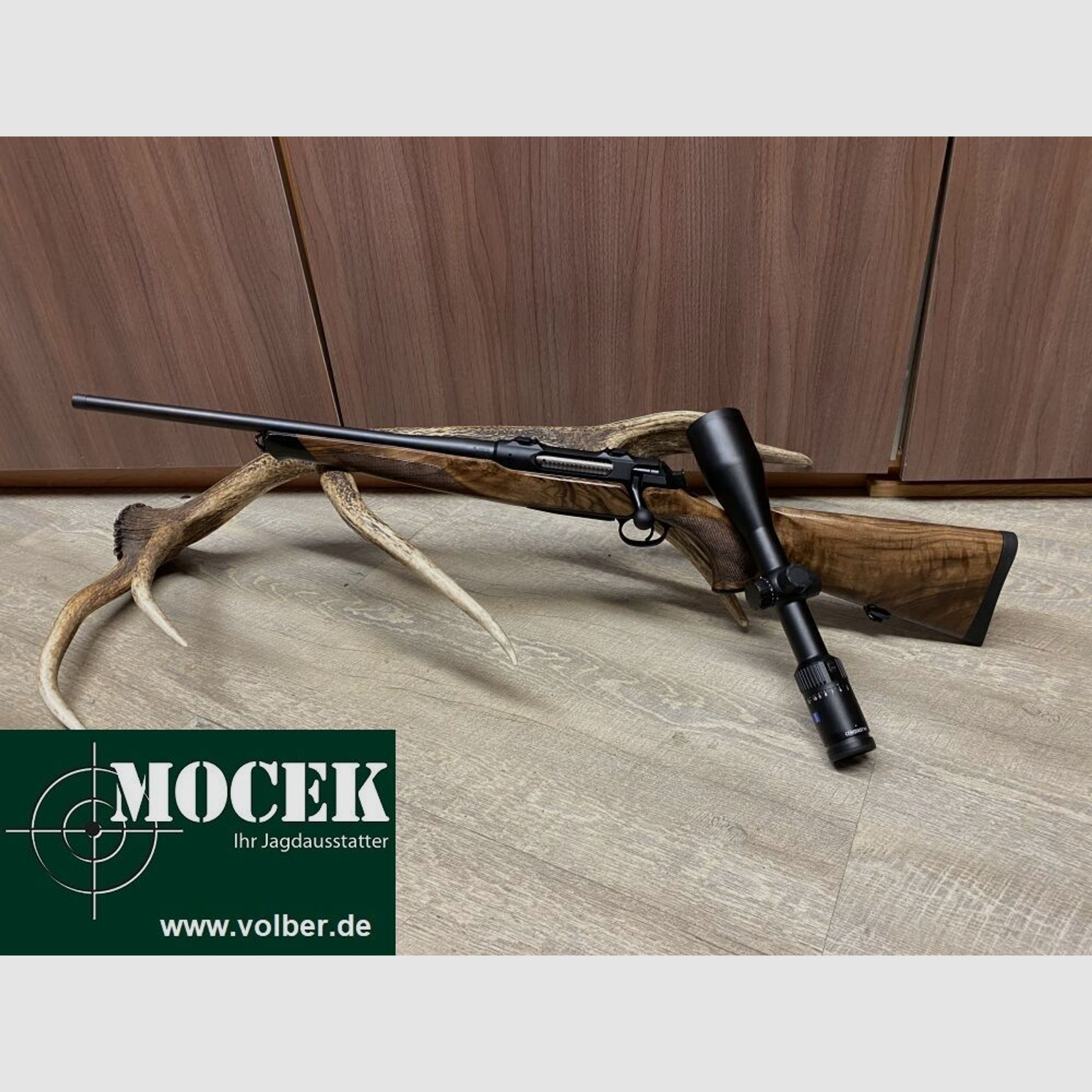 Sauer	 404 Classic links HK4, mit Zeiss Conquest V4 3-12x56