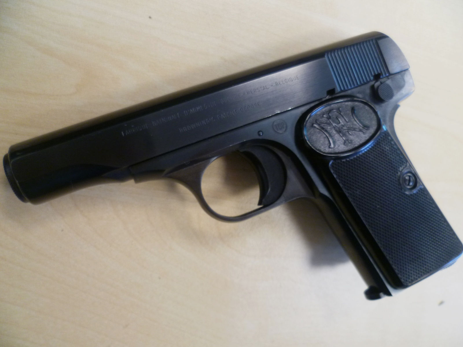 Pistole FN 1910 - 7,65 mm Browning / Ersatzmagazin / neuwertig